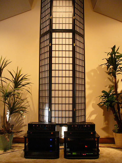 The final look with the treatments covered with two stacked acousticly transparent oriental room divider screens.