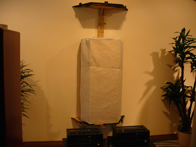 The first raw bundle of 703 underneath the screens. It consists of a bottom layer 2' x 4' six inches thick, topped with another layer 17