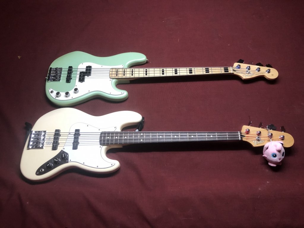 Here's a pic I took of both of my working ladies on a night out a few months ago. Both Mexican made, bottom bass circa '99, top bass '16 (I think). Both stock with the exception of a high mass bridge on the bottom bass.