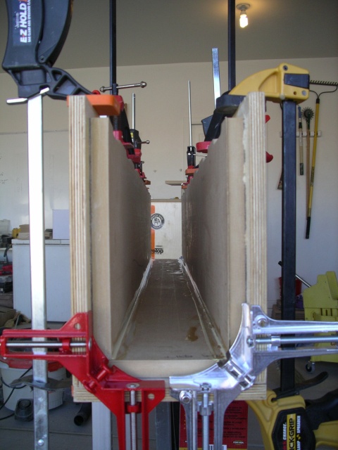 Finally gluing the back to the sides. Looking good!