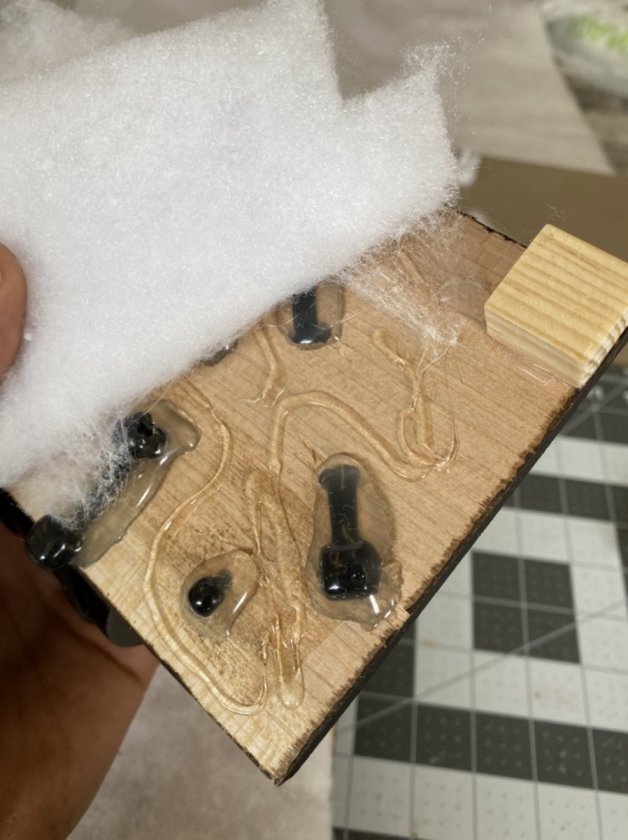 What happens when glue cools! Take it back off, or heat it up and push. It’s just Polly to help under. Don’t stress the need for perfection here.