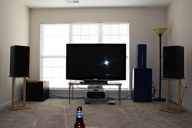 This is his system when sitting in the sweet spot. You will see a pair of Geddes Nathans, and 3 subs (1 ULF and 2 BB).