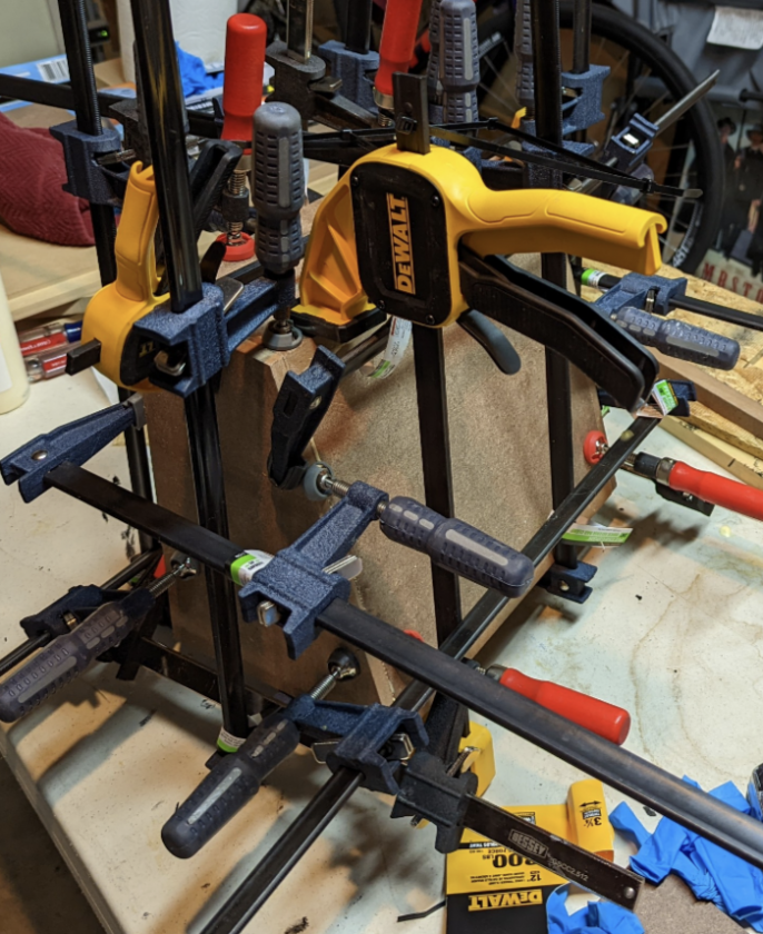 clamping-of-X-On-wall