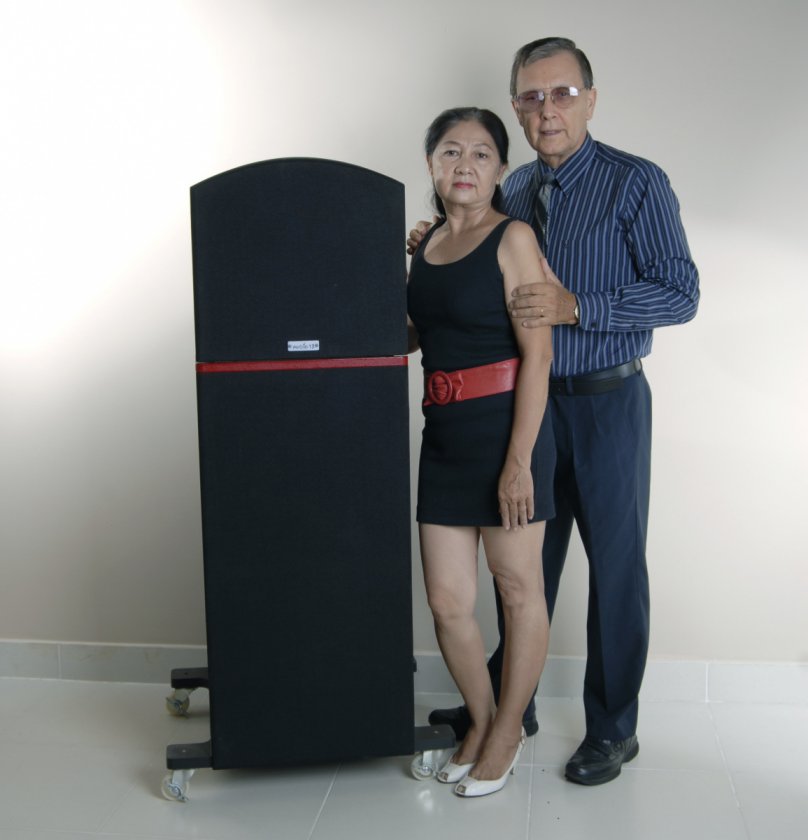 My wife and me with GR Research V1 speakers.