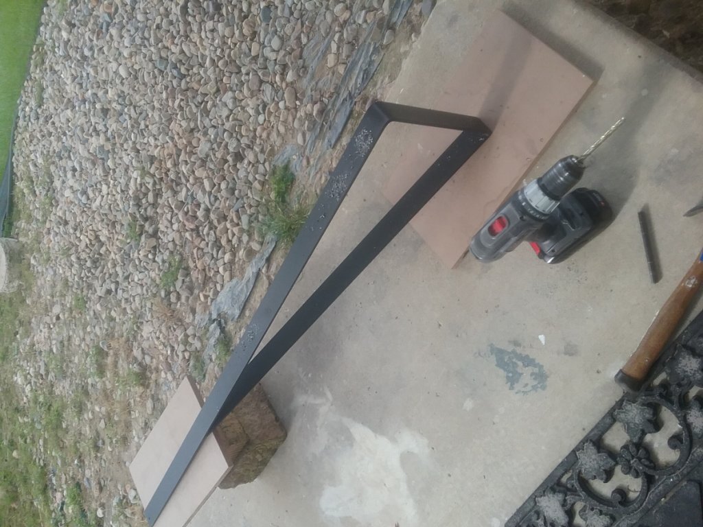 Drilled holes through brace.