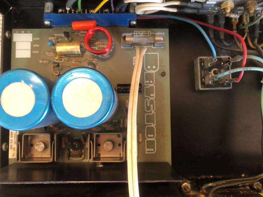 Figure 2: Original power supply capacitors, 6000 uF / 40 VDC - cartridge fuse is on circuit board's right-hand side.