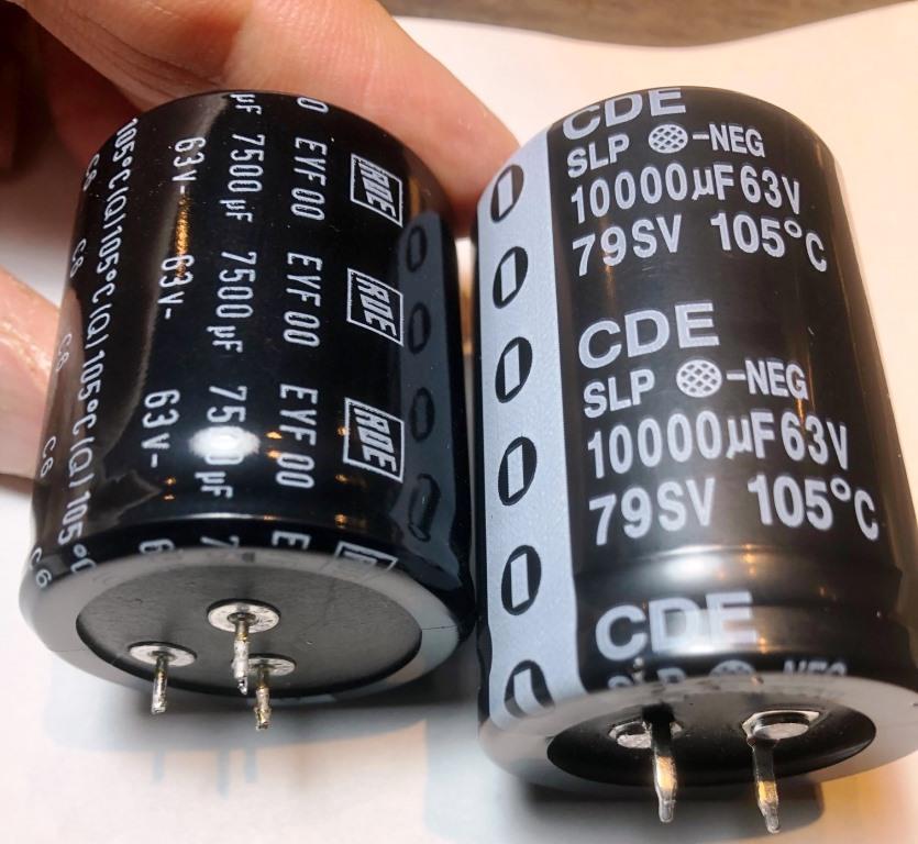 Figure 5. Original RDE with 3 straight leads as fitted (left), replacement CDE having 2 snap-in pins - note larger diameter pins (right).