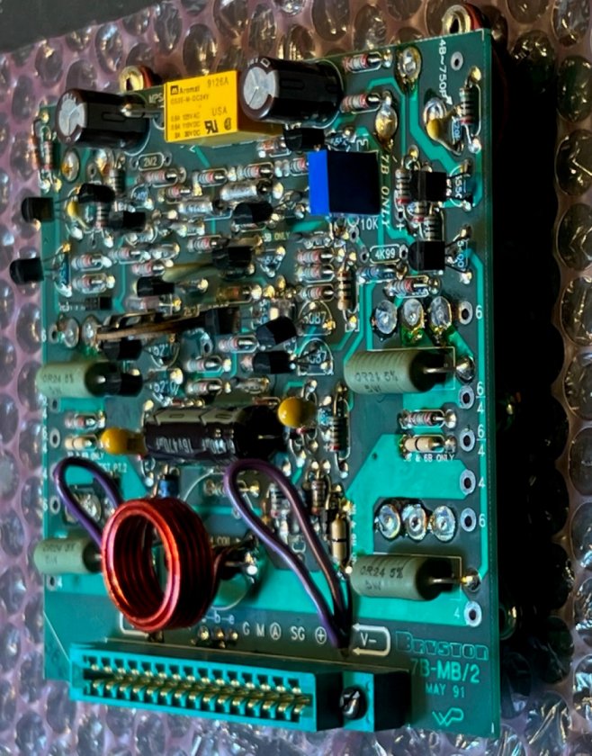 Figure 10. Two new tantalum capacitors installed on audio board (installation repeated for other board).