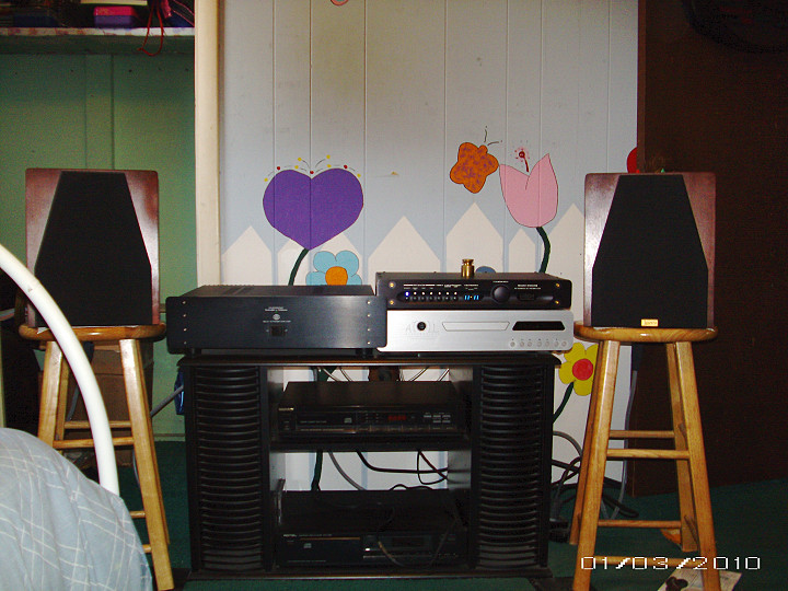 Lowered speakers by 14 in.pretty surprised how much better it sounds,esp. in smaller room