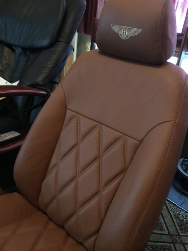 I found a couple of Bentley front seats that are fantastic for listening. Super comfortable, only a headrest behind your head, no "overhang" on either side of your body. Now if I can only get the seat heaters to work!