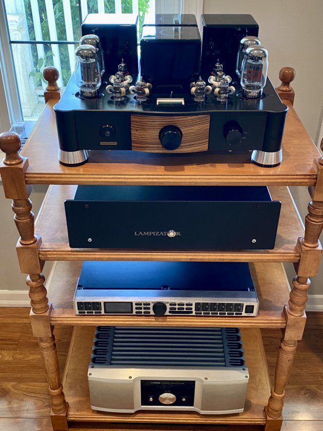 Yarland Auklet KT 88 Tube Integrated. 
Lampizator L4 Dac
Behringer Digital Crossover for Tom Foolery Stuff
Xindak XA6950 Integrated.
Custom Audio Rack by Dad
