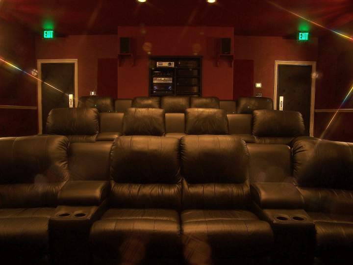 Seating in the theatre. Notice exit lights.