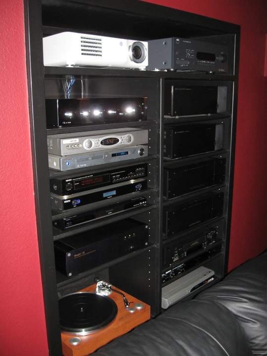 Audio equip. 7.1Theatre - B&K separates with NAD Pre/Pro.
2 Channel audio - Dynaco Pas 3 Series II tube & Sound Valves Mosfet 32.
speakers - VMPS RM2's (not pictured) L&R, VMPS Mini-Tower IIA's (centers), 
Dual Madisound Subs.
Turntable - Denon