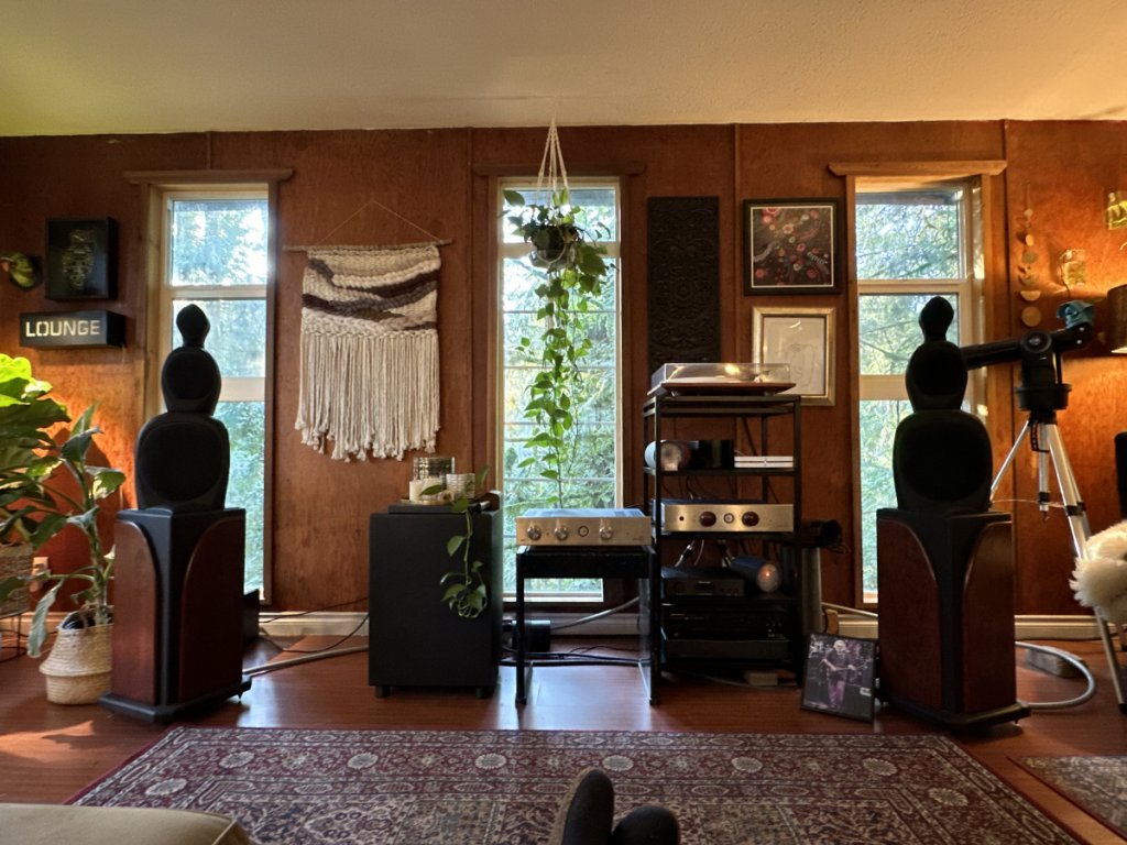 This is where all the music happens for me. The room is too wide and my queen will not allow any “acoustic” treatments.