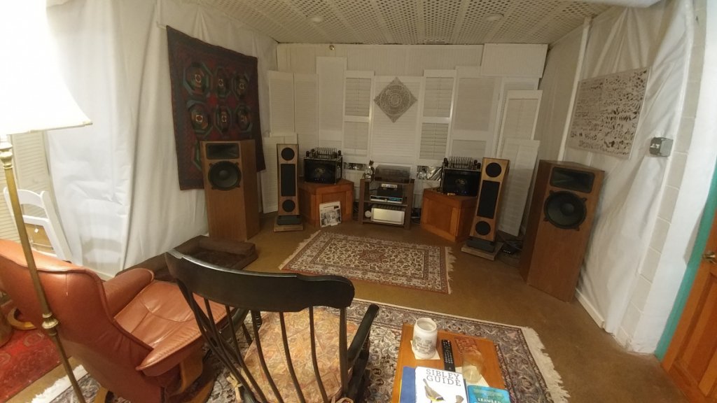 VERY little reverb. $100 for used shutters, $150 to hang used billboards from the ceiling, and mesh hardware store ceiling