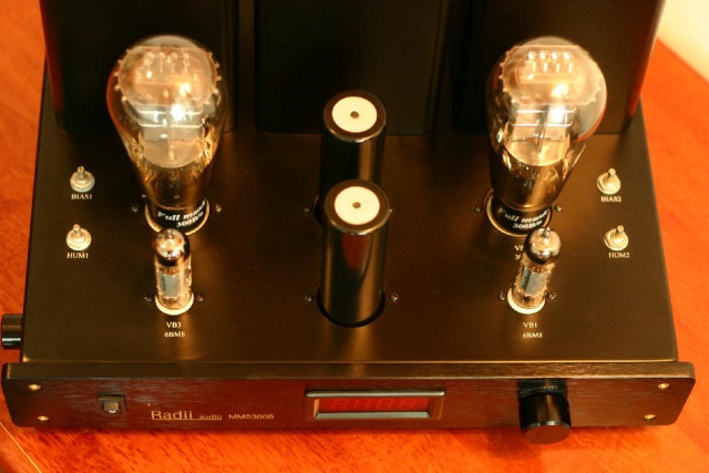 Top view, showing 300B and 6BM8 tubes, the upgraded JJ main capacitors, and the pots for adjusting tube bias and hum.