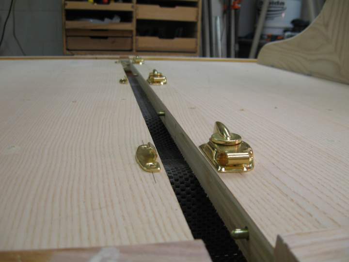 Fitting the alignment pins and locking mechanisms.