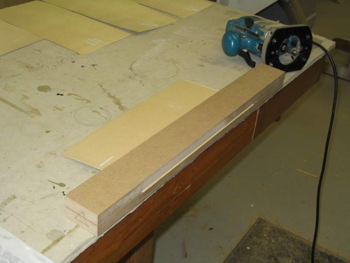 Simple jig makes it easy to match and join veneers.