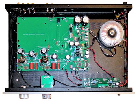 this is the T10 but RB reversion. The donut in upper right is the transformer and I loosened nut and rotated it per AVA suggestion. I think but cannot recall for sure that the noise came from the transformer itself. If careful, cannot hurt to try. YMMV