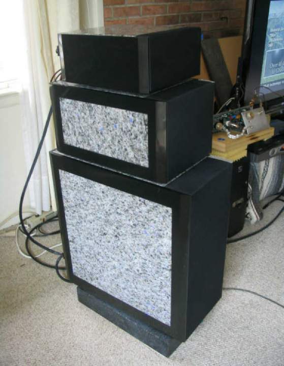 Each speaker consists of discrete bass, mid and treble modules fabricated from Granite, a central Aluminum casting, and various proprietary damping materials. I know more, but swore secrecy to designer Dale Pitcher.