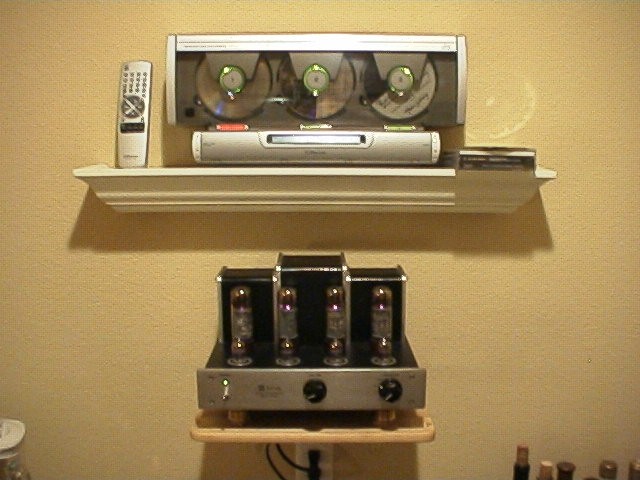 my 'pocket' system... Jolida 202 amp/Emerson 3 cd changer with line out/HTD in-wall speakers