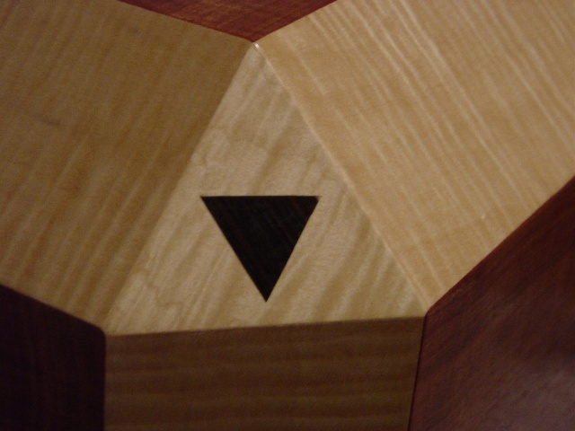 Detail of Ebony inlay in Dymax sub and veneer joints. - Close-up of Zach's Dymax sub showing the little inlay and the veneer joints. There are approximately 100 joints to fit in the construction of one of these subwoofers.