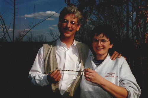 My Wife Lynn and I holding a snake or something.