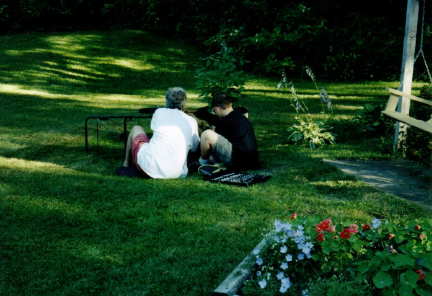 Jonny and I working on the lawn mower '03