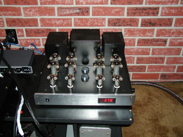 Here is my beloved tube amp. This is the Radii DPP-105 tweaked out tons. The cable you see coming out of the right is one of three in existence given to me as a gift from Ray Kimber. Both pieces are priceless to me, not to mention produce the best sound