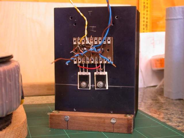 Amplifier heatsink with its wooden attachment