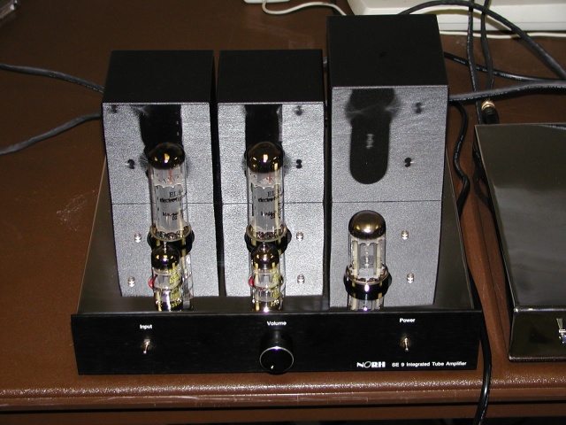 The SE-9. You can see your reflection in this baby, which makes it all the more perfect for a bedroom system.
