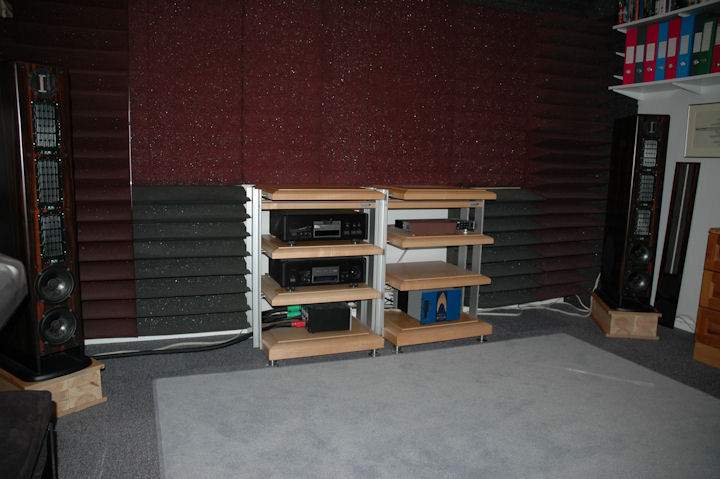 Whole system with VMPS RM30M speakers on 17cm high wooden blocks. TEAC P/70 CD Transport, TEAC D/70 DAC, Shunyata Hydra 8 Power Control, Behringer DEQ2496 Digital Equalizer and Son of Ampzilla amp. The D/70 acts as a pre-amp and the Behringer is connected between the P/70 and D/70 and works only in digital. Cables are Shunyata Aries, Taipan and Python, with speaker cables Van der Hul Snowtrack, biwired. The racks are Finite Elemente Pagoda Master Reference.


The foam is Auralex. In the corners of the wall and ceiling are LENRDs. The big wedges are VENUS, and the rest is Studiofoam 4