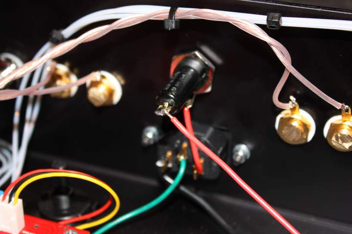 Closeup of IEC inlet. Furutech IEC, stranded 22 gauge Jena Labs Ultra wire, 6A fuse.