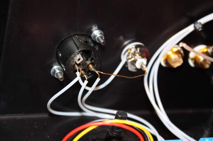 Closeup of XLR and RCA input wiring using a fine 26 gauge gold plated copper wire in teflon tubing.