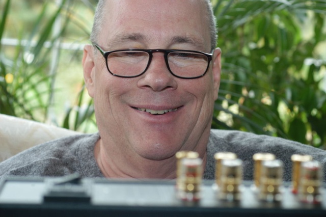 Jim holding his highly modified Unico integrated preamp