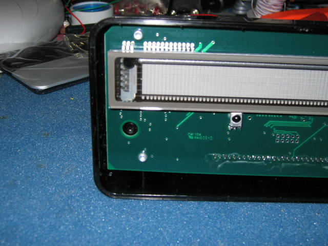 Close up showing screws holding board in place