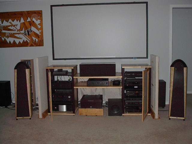Main System February 2011
Preamp - Modwright LS 36.5DM, Processor - Integra DTC 9.8
Amps - Bryston 14BSST, Bryston 6BSST, Marantz MA500 (rear center)
Speakers - Thiel 3.7s, MCS1, Power Points, SCS2 (rear center)
Subs - 2 Rel Storm IIIs, Rel Q150 (center), Rel Strata III (rears)
Sources - Modwright BDP-83, Bryston BDA-1, Squeezebox Touch, Marantz DV 9600 -
Other - Torus RM20, HDTV Tuner, HDMI Audio De-Embedder, Pioneer CLD-79 LD Player, Lexicon RF Demodulator, Upgraded Power Supplies for the Squeezebox Touch and HDMI Audio De-Embedder