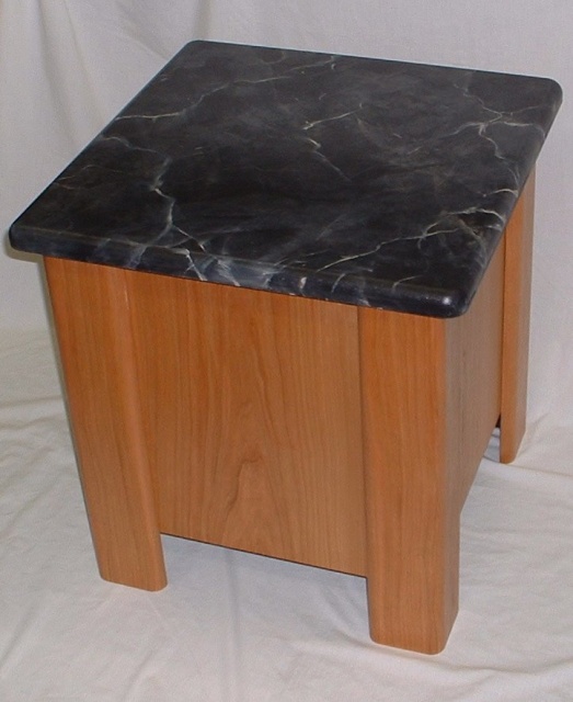 My cherry veneer/faux marble top cabient for the Adire Audio Tumult