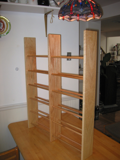 Used drill press forstner bit for dowel holes. For clean look, don't drill completely through the side boards.