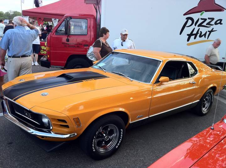 orange mustang at the Venetian Festival