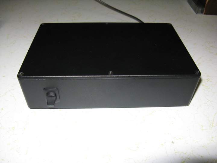 Front view of the power supply. The switch has an LED in the end which serves as a power indicator.