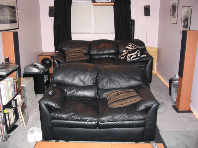 You can barely see the rear surrounds hanging on the wall in the back.