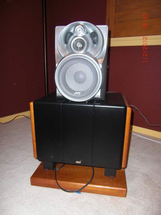Left Speaker and Sub - A cheesy JVC bookshelf that my company gave me and an ACI Force Sub