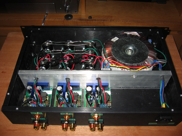Hypex Uc D 400amp 4: 
Plenty of room for 4th module to add an additional channel for a total of 8 channels. Adire says power supply is capable of handling the additional module.