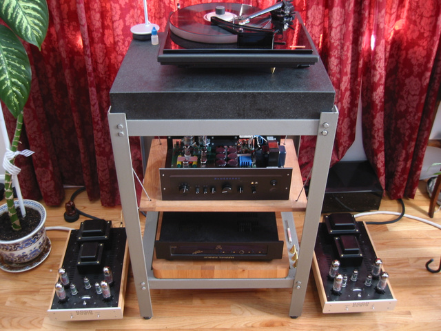 bottom-to-top: orig Shunyata Hydra (behind rack); Dodd 120 monos; Metronome CD2V Signature; Juicy Music Blueberry Xtreme w NOS tubes; Townshend Rock mk III/SME V/Clearaudio Virtuoso Wood mk2