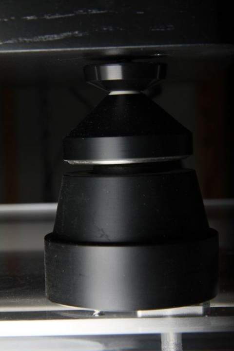 Stillpoints hard hats and 1/4-20 stud replace the feet of the VPI Classic, a Stillpoints cone is threaaded atop the VPI Classic foot and the ceramic ball of the Stillpoints cone points up into the hard hat. Better resonance control and isolation.