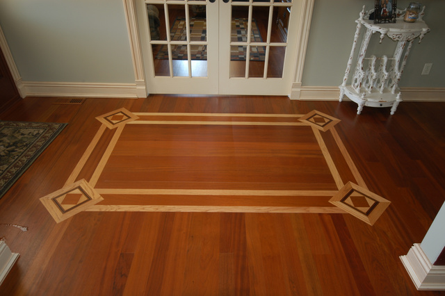 Jatoba with White Oak and Wenge inlay border - Our bread and butter....custom floors.