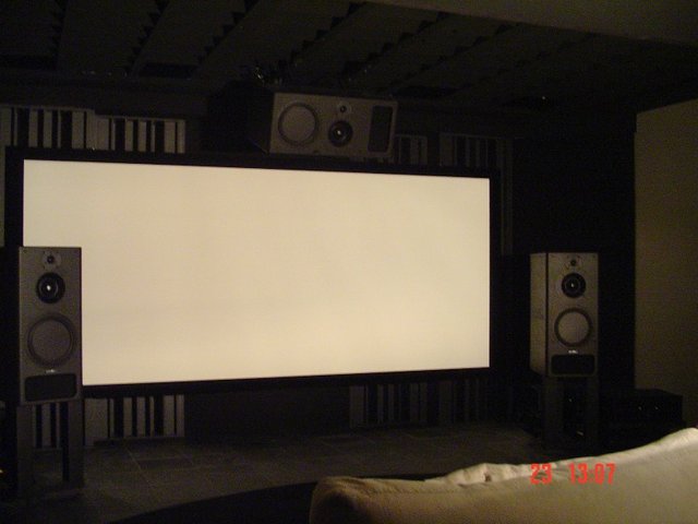 View when 2.35 scope screen in place - Screen snaps onto diffusors at the front of the room. Dalite High Power screen (125" wide)
