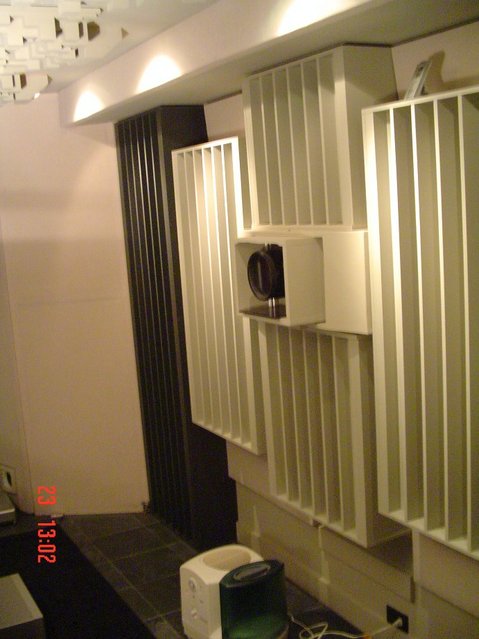 RPG diffusion and built in projector on rear wall. - Use ISCO 3 lens when watching scope movies.