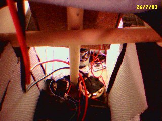 woofer view. The crossover lies on a piece of foam rubber. Coils and caps are covered with a dampening rubber sheet (Dynamat like). The mid enclosure is covered with cork.